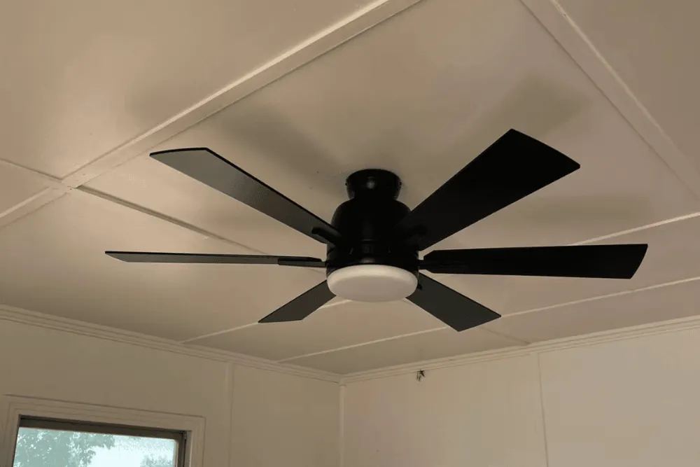 Ceiling Fan Installation Cost in West Texas a Black Ceiling Fan with Six Blades Mounted on a White Ceiling