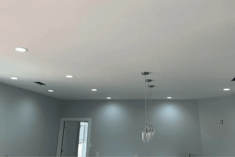 Recessed Lighting Installation Cost in West Texas a Living Room Lit by Recessed Ceiling Lights